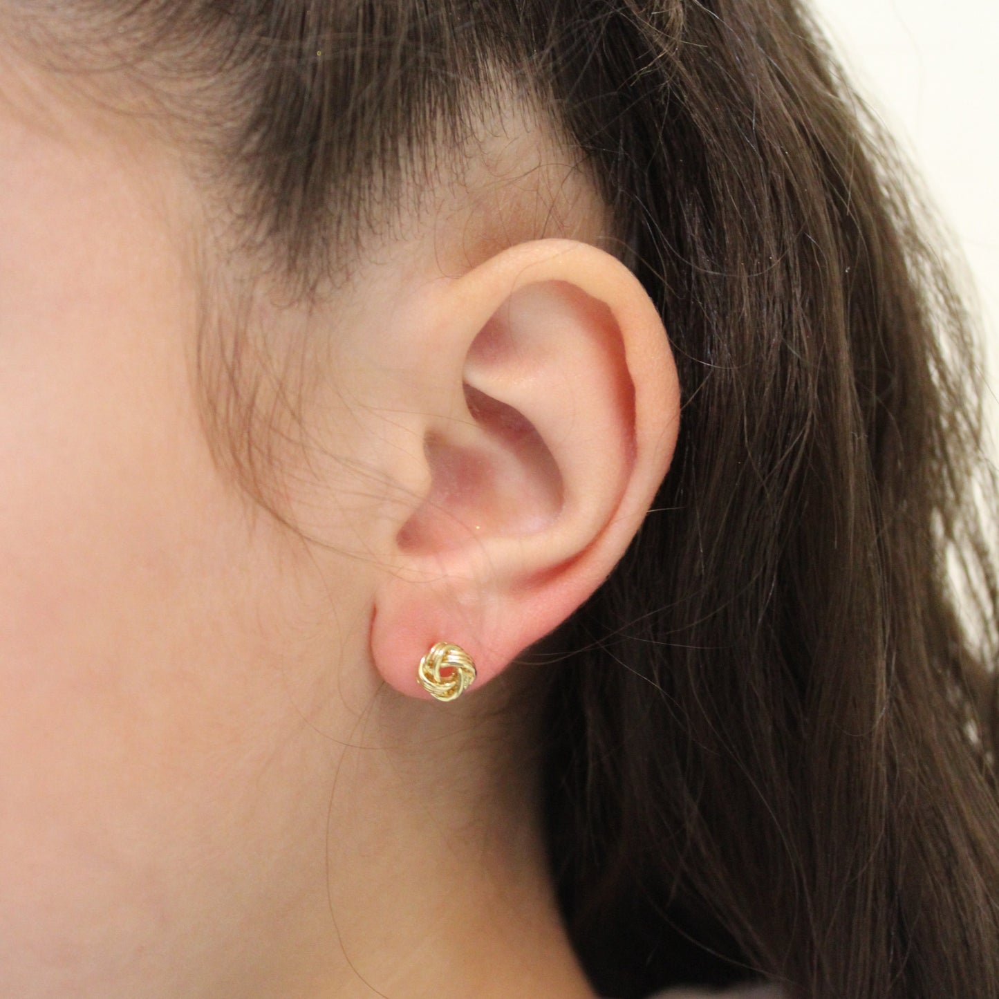Girls mini knot gold earrings