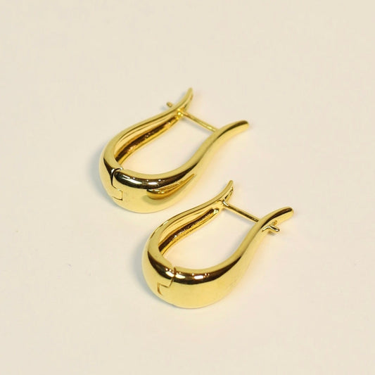 Long drop gold earrings