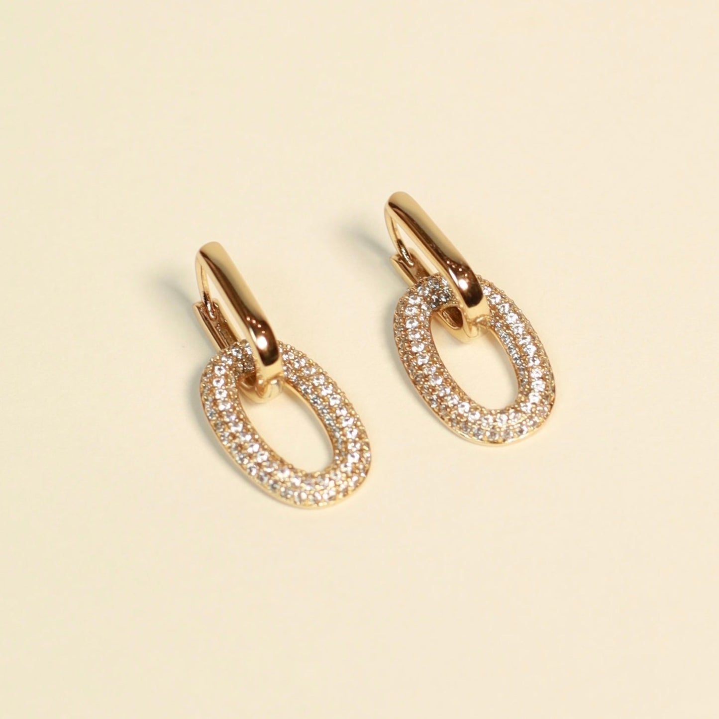 Link gold earrings with zirconias
