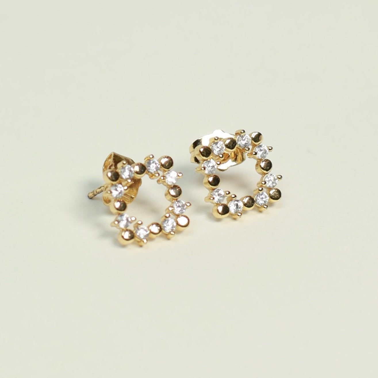 Square gold and zirconia studs