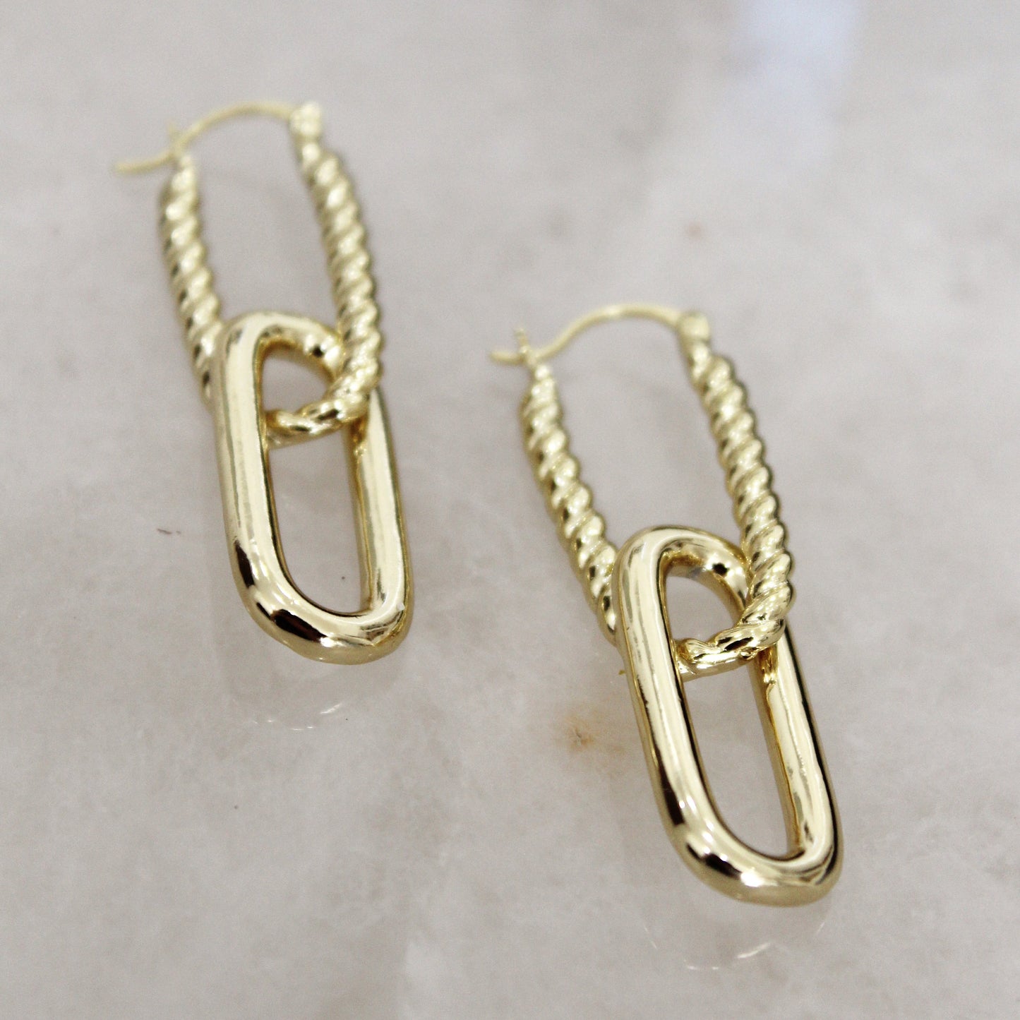 Gold linked long drop earrings