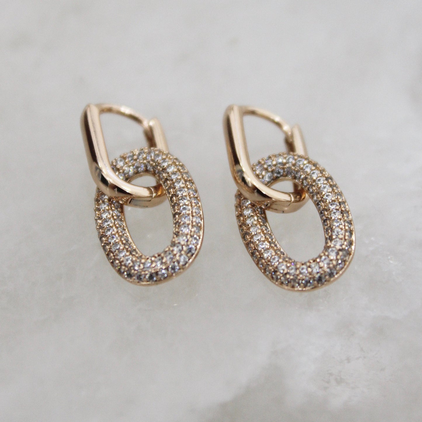 Link gold earrings with zirconias